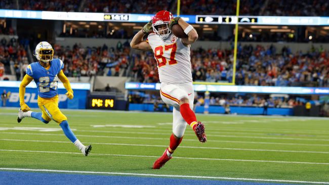 Travis Kelce skipping into the endzone.